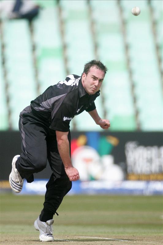 Mark Gillespie bowls to Jimmy Kamande