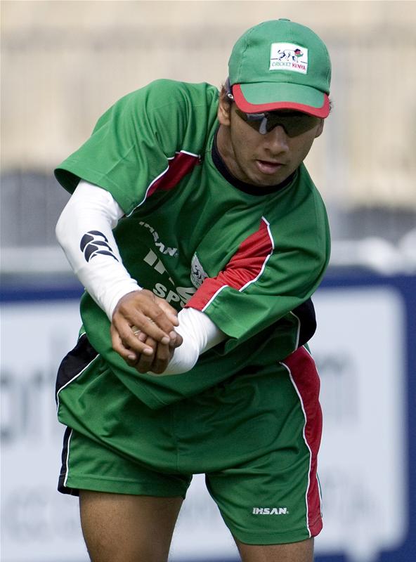 Tanmay Mishra catches the ball during a World Cup cricket training session