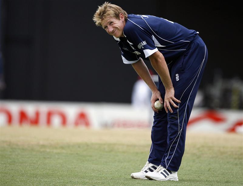 John Blain reacts before leaving the field while bowling against Australia