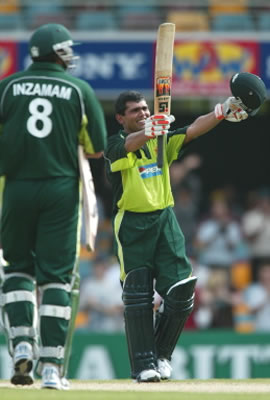 Pakistan wicketkeeper Kamran Akmal celebrates his maiden ODI century