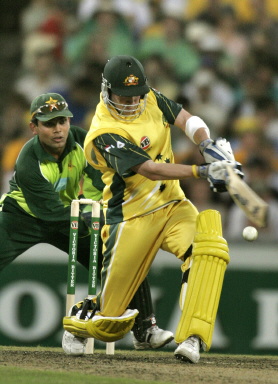 Michael Clarke pulls a ball during the day-night international against Pakistan