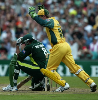 Inzamam-ul-Haq kneels at the crease after being caught for 50