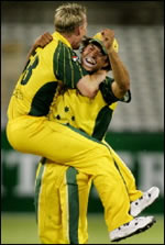 Andrew Symonds congratulated by Brett Lee