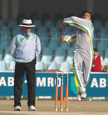 Stallions Mohammad Asif bowls as Aleem Dar supervises