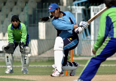 Aasia Khan of Karachi hits a ball