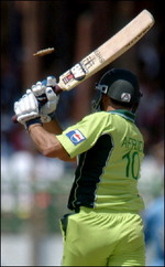 A bail flies over Shahid Afridi