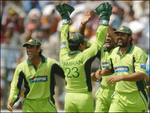 Inzamam-ul-Haq celebrates with teammates