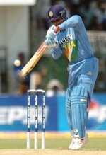 Virender Sehwag plays a cut to be caught by Shahid Afridi