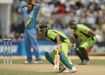 Salman Butt and Inzamam-ul-Haq run between wickets