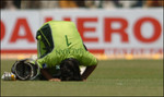 Salman Butt gives thanks to the Almighty by touching his forehead to the ground