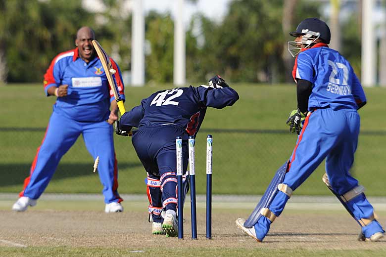 Cayman captain Pearson Best survives a stumping attempt by Bermudan wicket-keeper