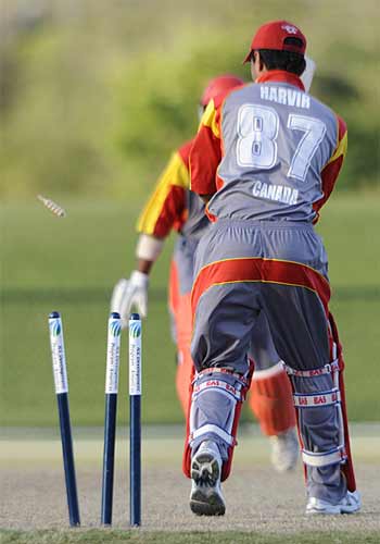 Canadas Harvir Baidwan is bowled by Imran Awan as USA beat Canada