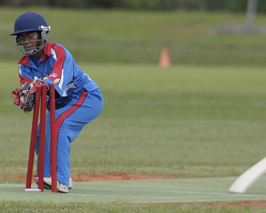 Bermuda wicket-keeper Rickelle Smith completes the run out just in time