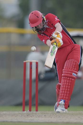 Mikaela Turik of Canada on the drive against USA