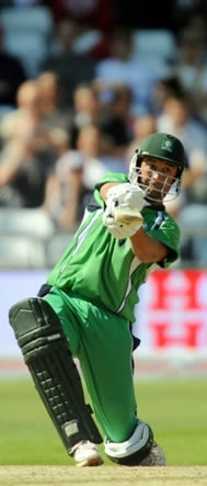 Andre Botha hits a four