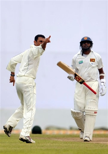 Younis Khan celebrates the wicket of Samaraweera