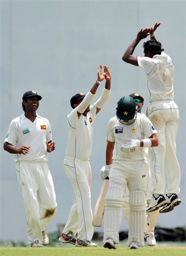 Mirando celebrates the wicket of Kamran