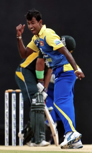 Kulasekara celebrates the wicket of Nasir Jamshed