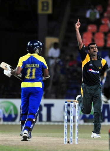 Iftikhar Anjum celebrates the wicket of Sangakkara