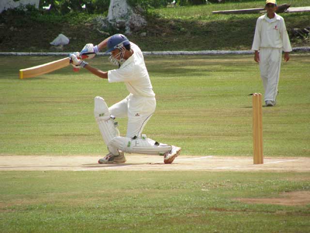 Cayman Islands batsman in action