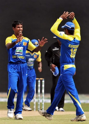 Kulasekara celebrates the wicket of Kamran