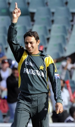 Saeed Ajmal celebrates the wicket of Sammy