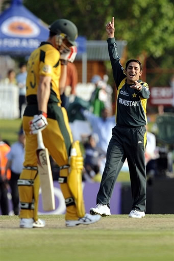 Saeed Ajmal celebrates the wicket of Johnson