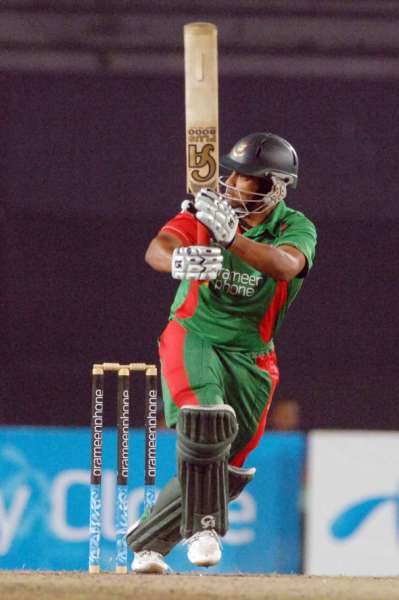 Tamim Iqbal sends one to the mid-wicket boundary during his 80 off 72  balls