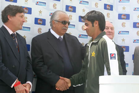 Salman Butt shakes hand with PCB Chairman during presentation