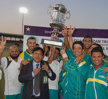 HBL captain Hasan Raza and teammates celebrate with Trophy