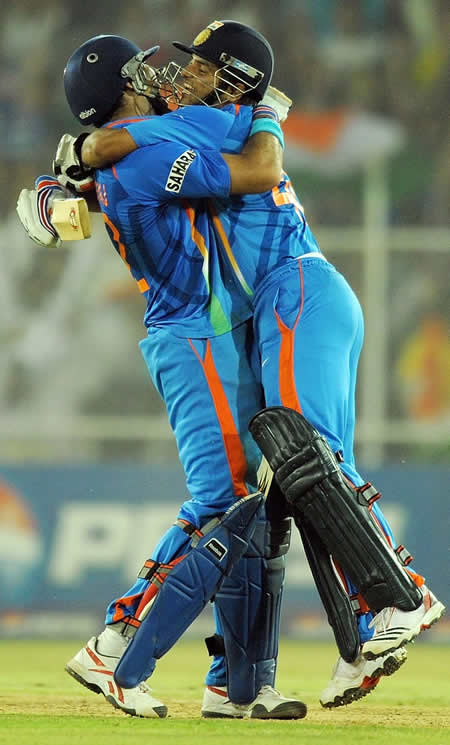 Yuvraj Singh and Suresh Raina celebrate after winning the World Cup Quarter-Final against Australia