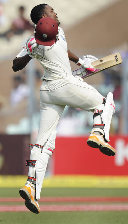 Darren Bravo jumps in joy after reaching his century