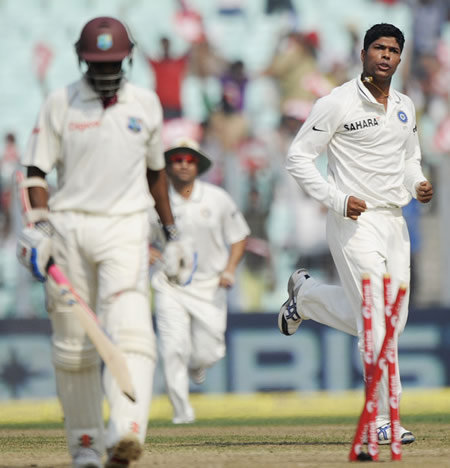 Shivnarine Chanderpaul walks back after having his stumps wrecked by Umesh Yadav