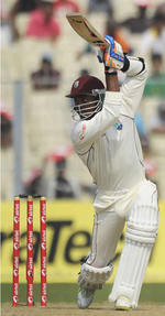 Marlon Samuels drives fluently through the covers