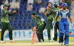 Shahid Afridi celebrates the wicket of Jeevan Mendis