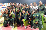 The victorious Pakistan team strikes a happy pose