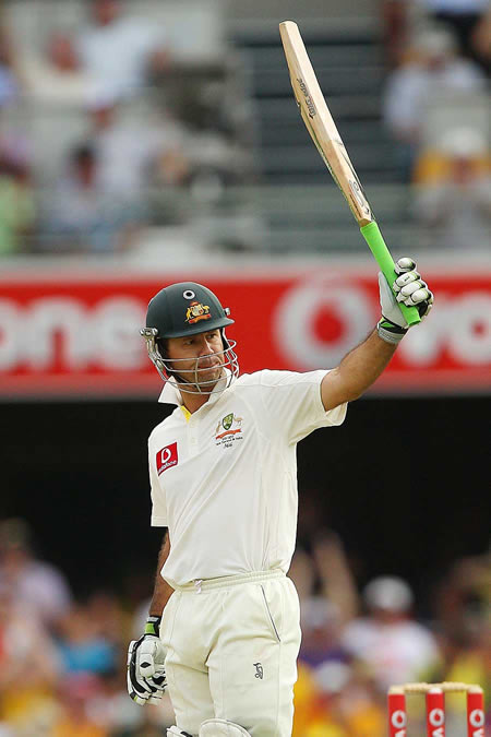 Ricky Ponting celebrates his half-century