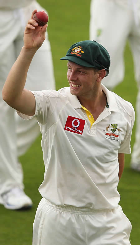 James Pattinson displays the ball with which he claimed his five-for