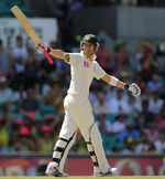 Michael Clarke celebrates his half-century