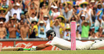 Ricky Ponting dives in to his crease to complete his century