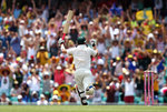 Michael Clarke pumps his fist after reaching his century