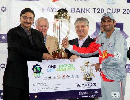 Shoaib Malik poses with the trophy