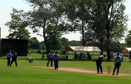 Henry Osinde preparing to face the 5th ball of the 20th over