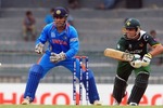 Kamran Akmal plays the cut shot