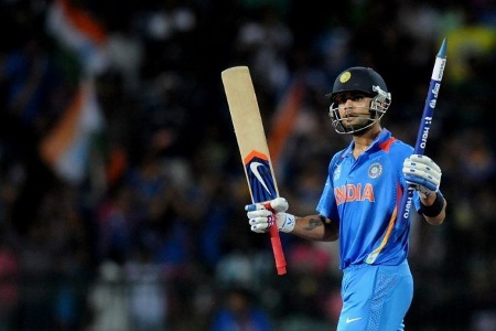 Virat Kohli celebrates after beating Pakistan