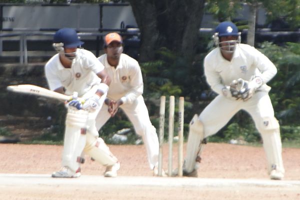 Ali Asgar plays a shot