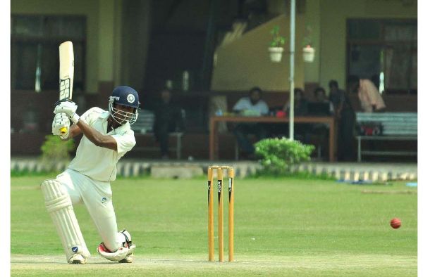 KS Vishnu plays a shot	