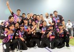 Faisalabad Wolves pose with the trophy