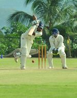 Manik Gupta hits a boundary