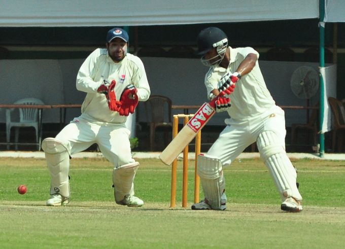 Robert Fernandez hits a boundary